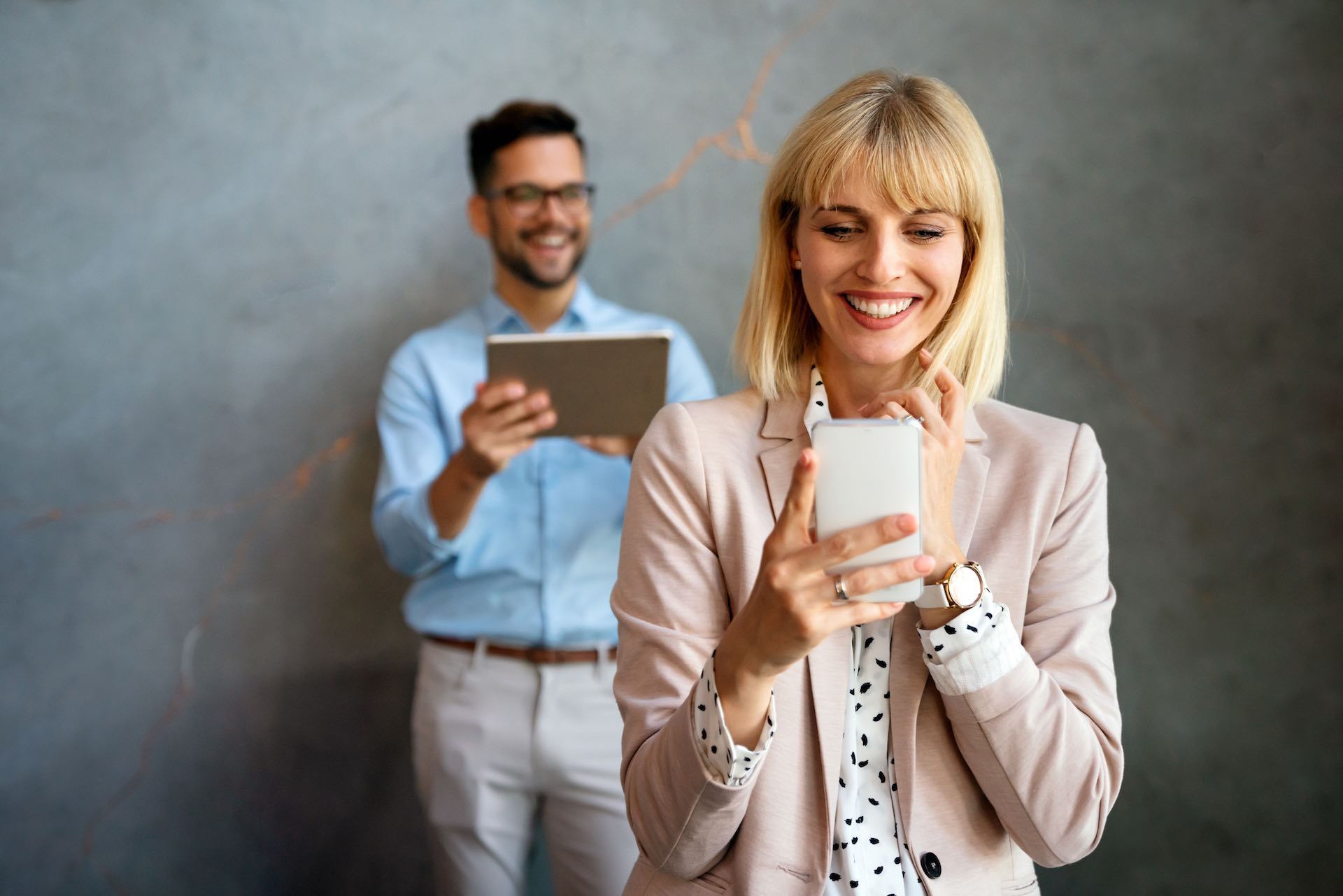 Portrait of success business colleagues working, smiling together in office. Business people teamwork concept.