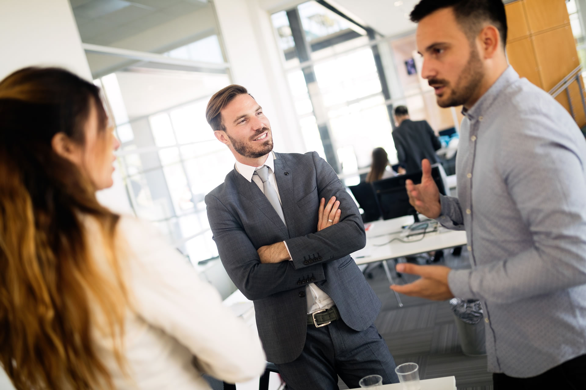 group-of-coworkers-working-together-on-business-FLCPRVA